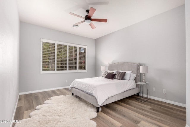 1925 W Olive Way, Chandler, AZ 85248 - bedroom featuring wood finished floors, baseboards, and ceiling fan