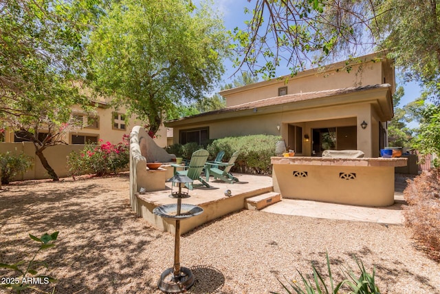 1925 W Olive Way, Chandler, AZ 85248 - rear view of property with stucco siding, a patio, and area for grilling