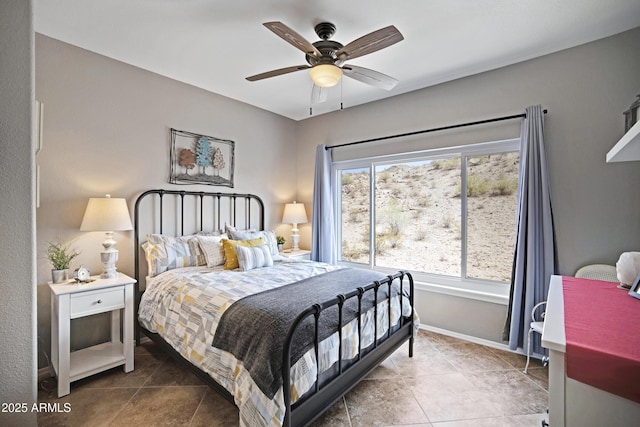 3236 E Chandler Blvd Unit 2018, Phoenix, AZ 85048 - bedroom featuring tile patterned floors and a ceiling fan