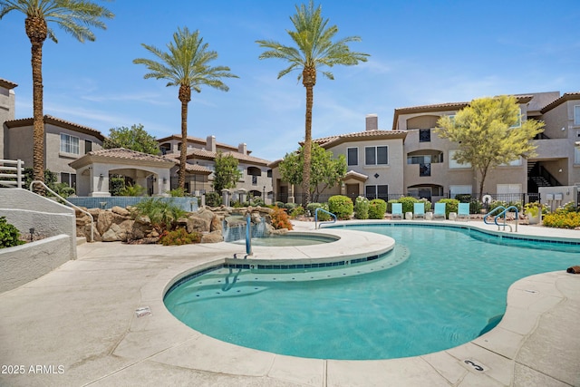 3236 E Chandler Blvd Unit 2018, Phoenix, AZ 85048 - community pool with a residential view