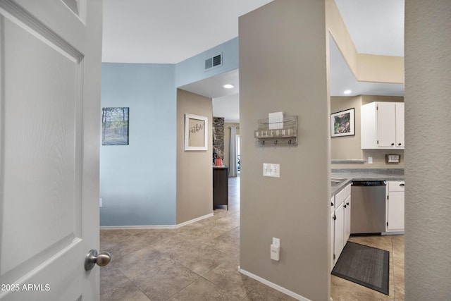 3236 E Chandler Blvd Unit 2018, Phoenix, AZ 85048 - corridor featuring light tile patterned floors and baseboards