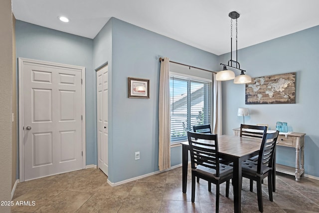 3236 E Chandler Blvd Unit 2018, Phoenix, AZ 85048 - dining room featuring baseboards