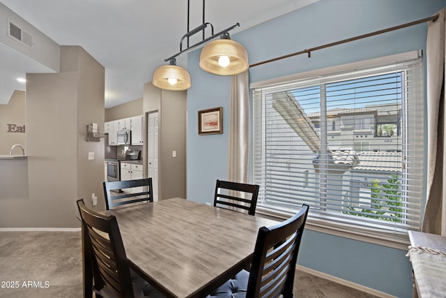 3236 E Chandler Blvd Unit 2018, Phoenix, AZ 85048 - dining area featuring baseboards