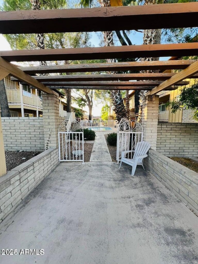 view of patio / terrace featuring a fenced in pool