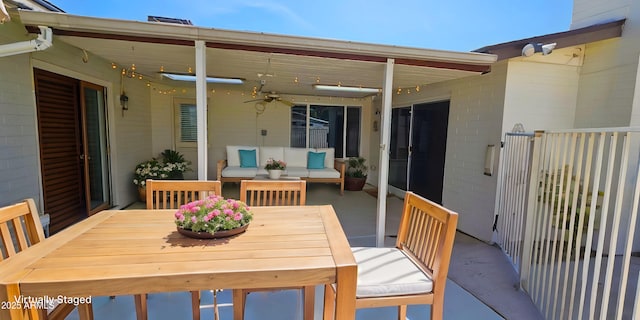 view of patio / terrace featuring outdoor dining area, ceiling fan, and an outdoor living space