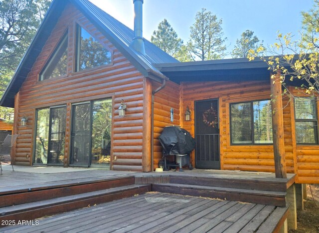 2028 Jones Pass, Overgaard, AZ 85933 - rear view of property with a wooden deck and faux log siding