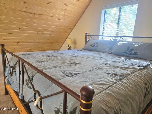 2028 Jones Pass, Overgaard, AZ 85933 - bedroom featuring carpet floors, lofted ceiling, and wood ceiling