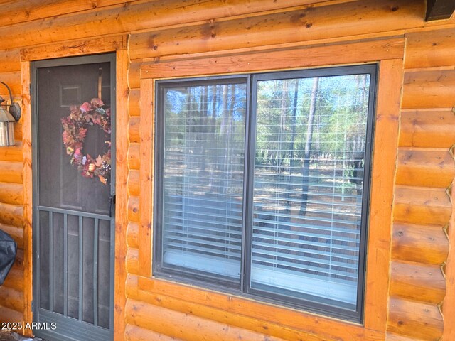 2028 Jones Pass, Overgaard, AZ 85933 - exterior view of log veneer siding