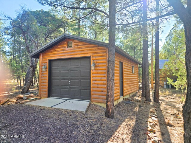 2028 Jones Pass, Overgaard, AZ 85933 - detached garage featuring driveway