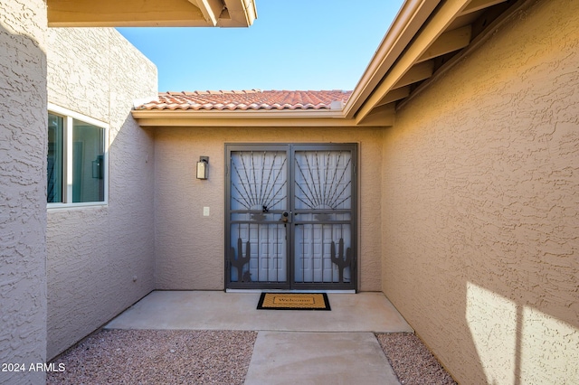 doorway to property with french doors