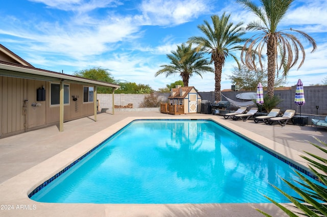 view of pool featuring a patio