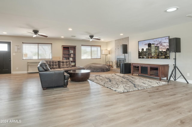 living room with a healthy amount of sunlight and light wood-type flooring