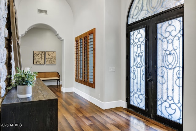 2527 E Beechnut Ct, Chandler, AZ 85249 - foyer featuring french doors, dark wood-style flooring, and baseboards