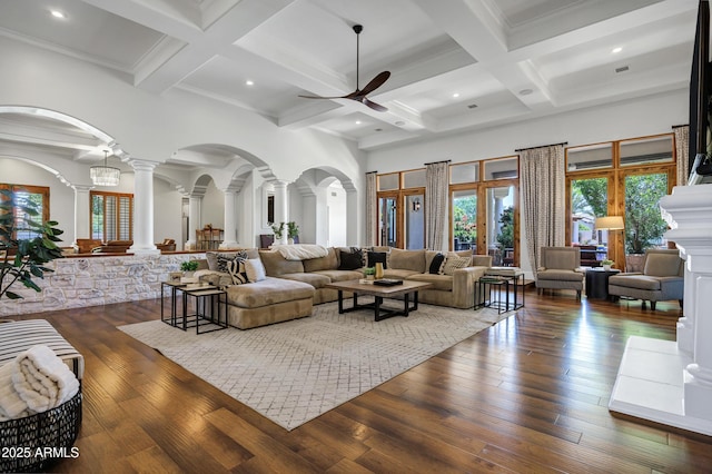 2527 E Beechnut Ct, Chandler, AZ 85249 - living room featuring decorative columns, arched walkways, a ceiling fan, plenty of natural light, and coffered ceiling