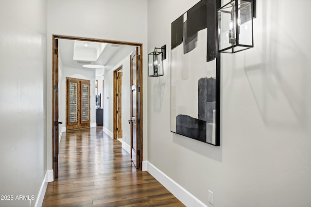 2527 E Beechnut Ct, Chandler, AZ 85249 - hall featuring dark wood-type flooring, baseboards, and french doors