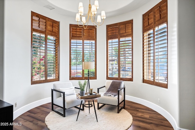 2527 E Beechnut Ct, Chandler, AZ 85249 - sitting room with a chandelier, baseboards, and dark wood-type flooring