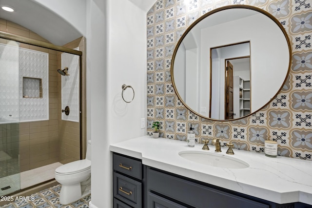 2527 E Beechnut Ct, Chandler, AZ 85249 - bathroom featuring toilet, a stall shower, vanity, and backsplash