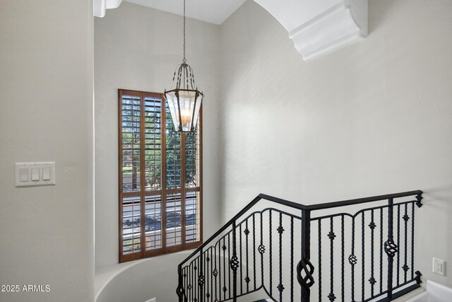 2527 E Beechnut Ct, Chandler, AZ 85249 - staircase with a chandelier