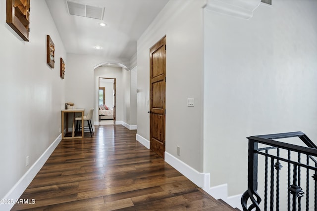 2527 E Beechnut Ct, Chandler, AZ 85249 - corridor with arched walkways, dark wood-style flooring, recessed lighting, and baseboards