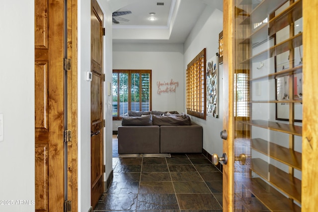 2527 E Beechnut Ct, Chandler, AZ 85249 - corridor with stone tile floors, baseboards, crown molding, a tray ceiling, and recessed lighting