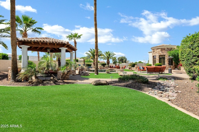 2527 E Beechnut Ct, Chandler, AZ 85249 - view of grassy yard featuring a gazebo, a patio, and exterior fireplace