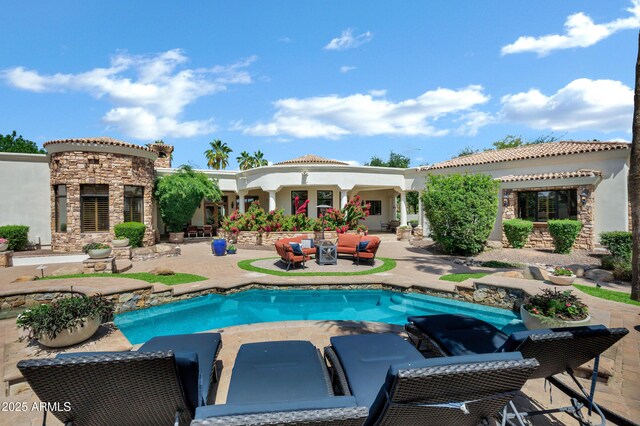 2527 E Beechnut Ct, Chandler, AZ 85249 - back of property with a patio area, stucco siding, an outdoor pool, stone siding, and outdoor lounge area