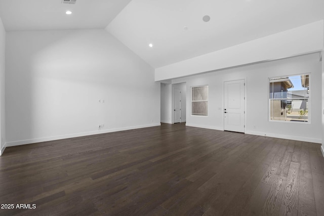 unfurnished living room with visible vents, baseboards, lofted ceiling, dark wood-style flooring, and recessed lighting