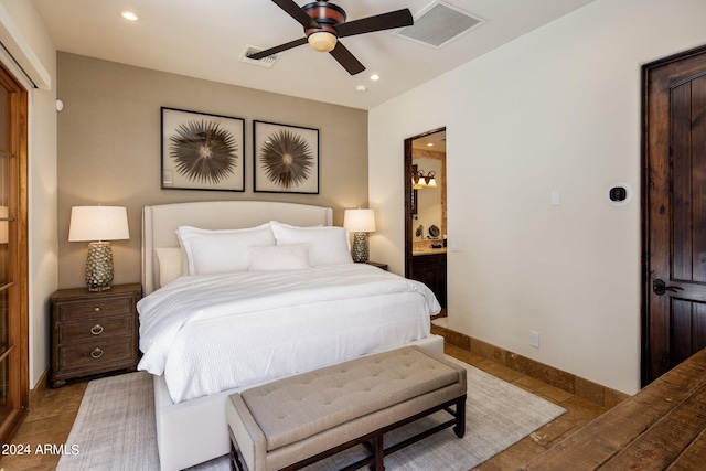 bedroom featuring ceiling fan and connected bathroom