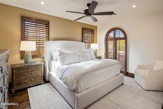 bedroom featuring ceiling fan and wood-type flooring