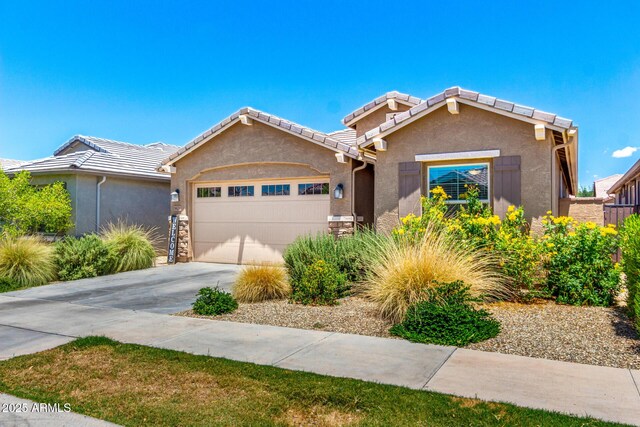 9624 E Thunderbolt Ave, Mesa, AZ 85212 - view of front of house with a garage, stucco siding, concrete driveway, and a tiled roof