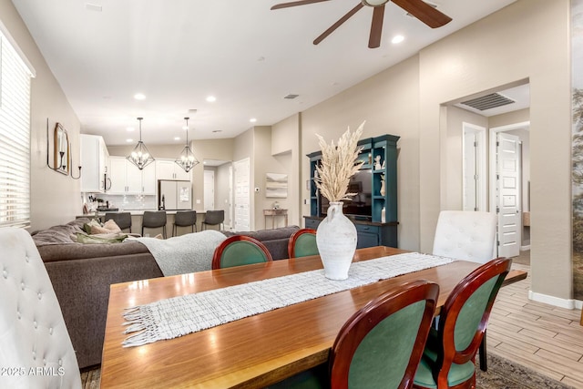 9624 E Thunderbolt Ave, Mesa, AZ 85212 - dining space featuring ceiling fan, light wood finished floors, and recessed lighting