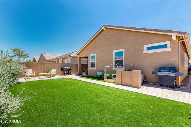 9624 E Thunderbolt Ave, Mesa, AZ 85212 - back of house with a patio and stucco siding