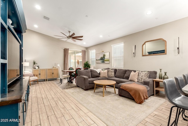 9624 E Thunderbolt Ave, Mesa, AZ 85212 - living area with light wood-type flooring, ceiling fan, vaulted ceiling, and recessed lighting