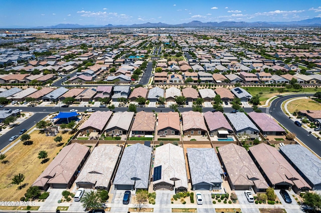 9624 E Thunderbolt Ave, Mesa, AZ 85212 - aerial view of property and surrounding area with mountains and nearby suburban area