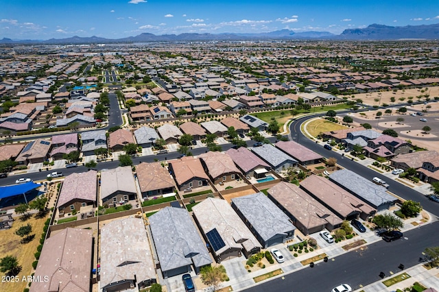 9624 E Thunderbolt Ave, Mesa, AZ 85212 - aerial overview of property's location featuring a mountain backdrop and nearby suburban area