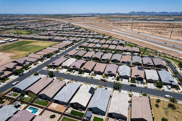 9624 E Thunderbolt Ave, Mesa, AZ 85212 - aerial view of property and surrounding area featuring nearby suburban area and a mountain backdrop
