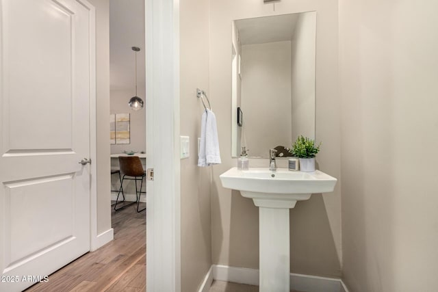 3131 N Central Ave Unit 3004, Phoenix, AZ 85012 - bathroom with wood finished floors and baseboards