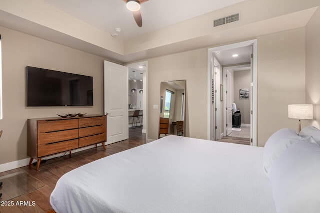 3131 N Central Ave Unit 3004, Phoenix, AZ 85012 - bedroom featuring dark wood-style floors, ceiling fan, and recessed lighting