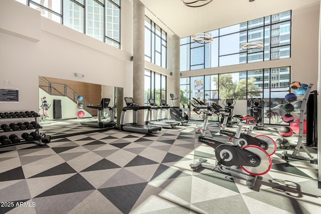 3131 N Central Ave Unit 3004, Phoenix, AZ 85012 - gym with a towering ceiling and carpet flooring
