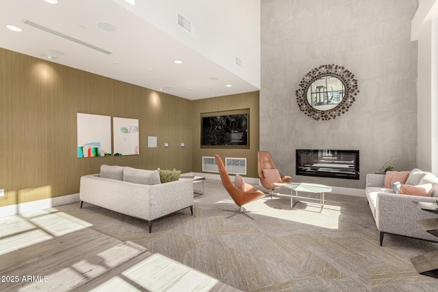 3131 N Central Ave Unit 3004, Phoenix, AZ 85012 - living room with a towering ceiling, a fireplace, and recessed lighting