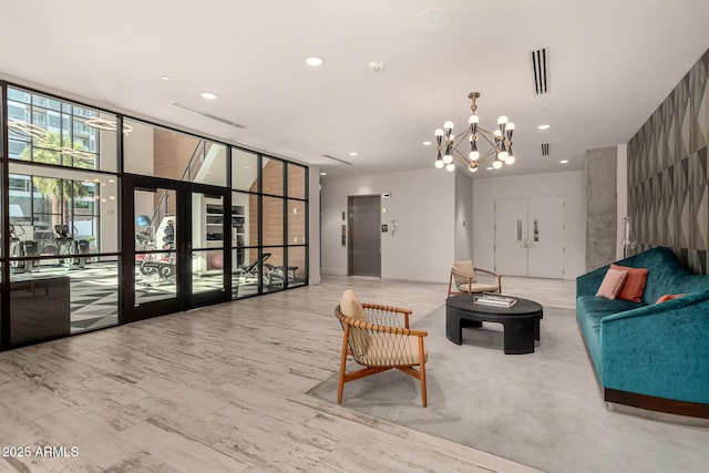 3131 N Central Ave Unit 3004, Phoenix, AZ 85012 - building lobby with a wall of windows and recessed lighting