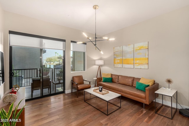 3131 N Central Ave Unit 3004, Phoenix, AZ 85012 - living room with a chandelier and wood finished floors