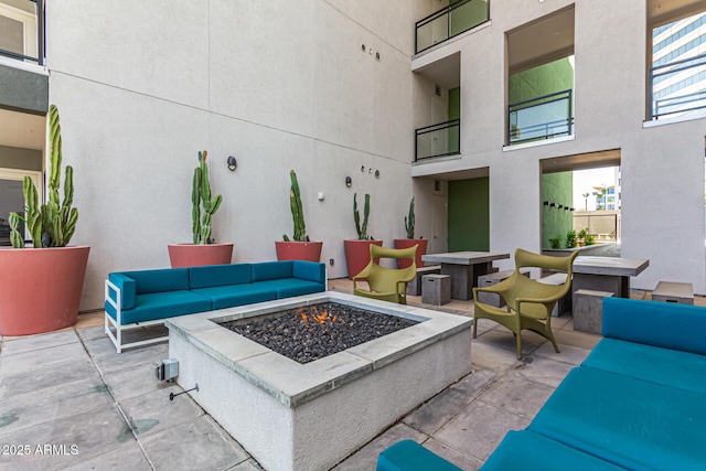 3131 N Central Ave Unit 3004, Phoenix, AZ 85012 - view of patio featuring an outdoor living space with a fire pit