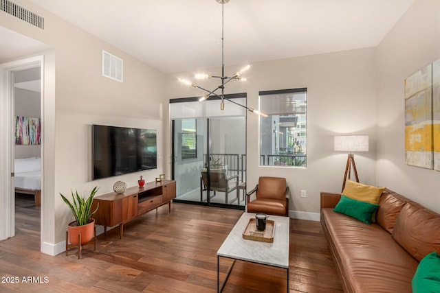 3131 N Central Ave Unit 3004, Phoenix, AZ 85012 - living area with a chandelier and wood finished floors