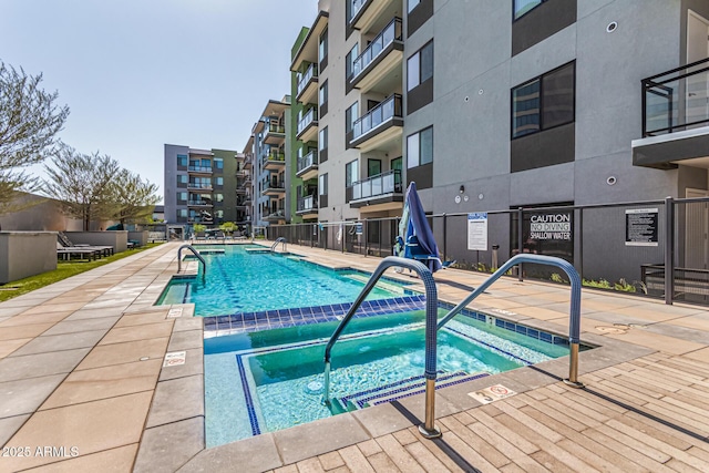 3131 N Central Ave Unit 3004, Phoenix, AZ 85012 - community pool with a hot tub
