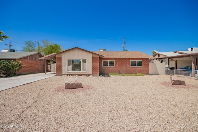 3644 W Maryland Ave, Phoenix, AZ 85019 - back of property with brick siding and concrete driveway