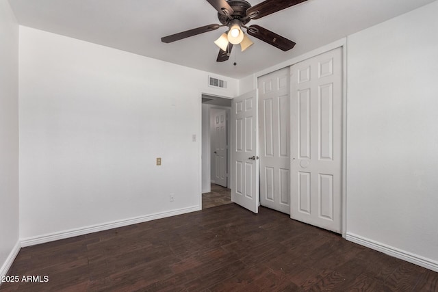 3644 W Maryland Ave, Phoenix, AZ 85019 - unfurnished bedroom featuring dark wood-type flooring, baseboards, a closet, and a ceiling fan