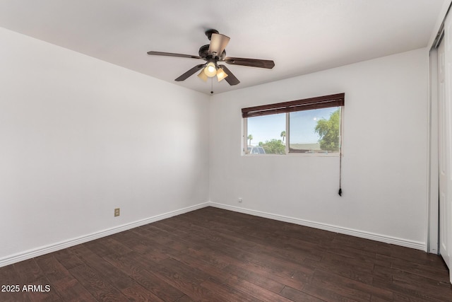3644 W Maryland Ave, Phoenix, AZ 85019 - empty room featuring dark wood-style floors, ceiling fan, and baseboards