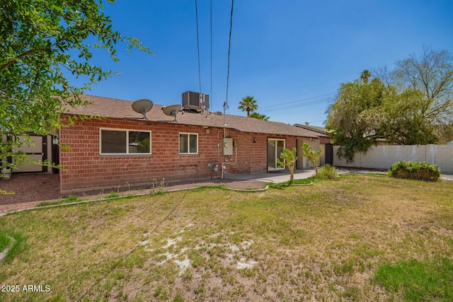 3644 W Maryland Ave, Phoenix, AZ 85019 - rear view of property with cooling unit, a patio area, and brick siding