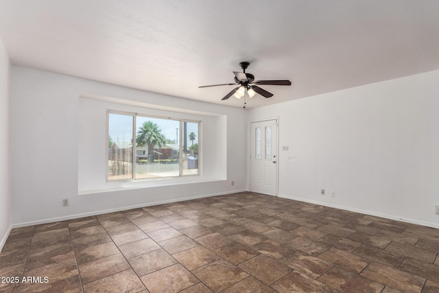 3644 W Maryland Ave, Phoenix, AZ 85019 - unfurnished room with a ceiling fan and baseboards